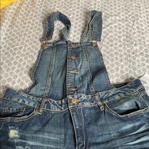 Overalls never worn. Distressed jean.